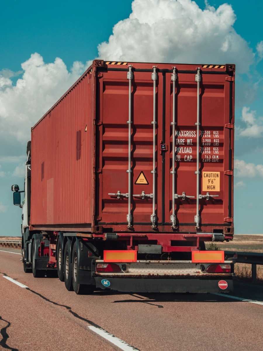 Cargo ship at port with containers